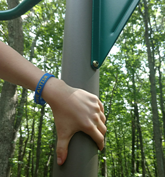 Child wearing "I Have Autism" Children's Bracelet 